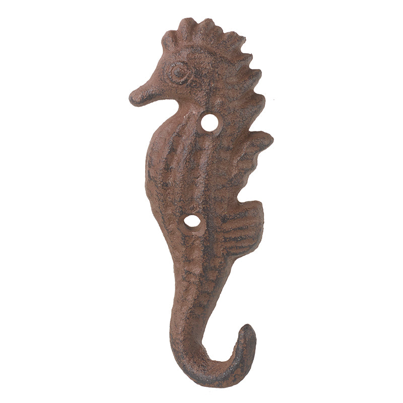 A brown metal hook in the shape of a seahorse.