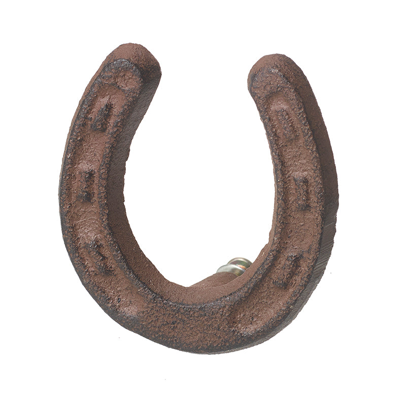 A brown iron horseshoe hook against a white background