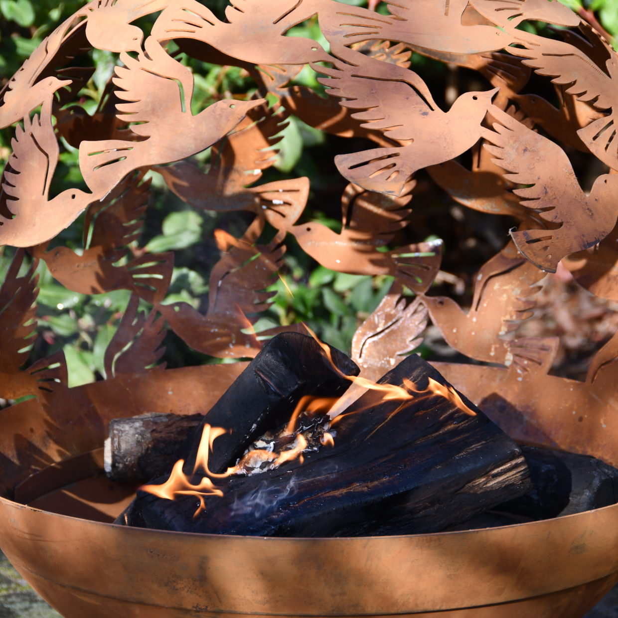 Fallen Fruits Fire Pit Globe with Laser Cut Bird Design