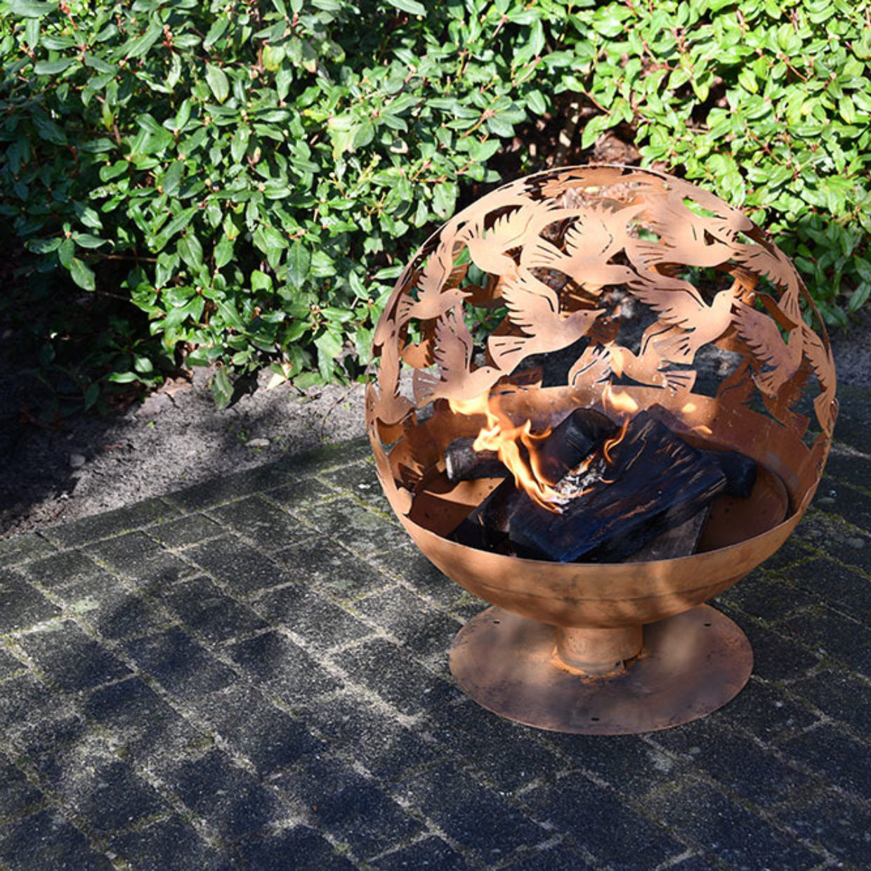 Fallen Fruits Fire Pit Globe with Laser Cut Bird Design