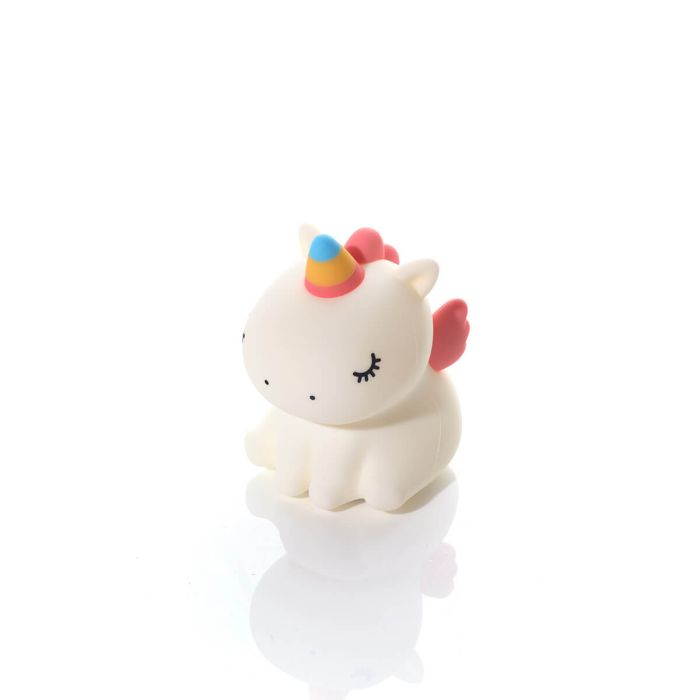 Unicorn-shaped silicone night light with a colourful horn on a white background