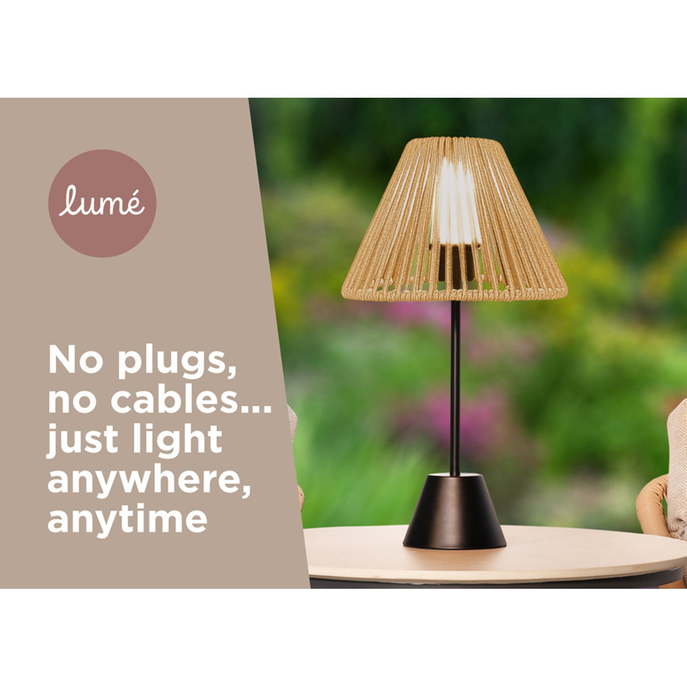 Lumé outdoor lamp with wicker shade on a table outdoors.