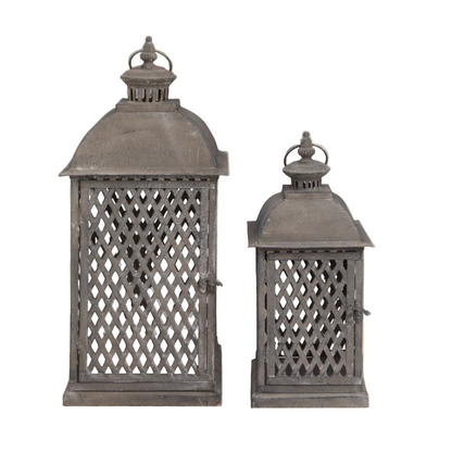 Two decorative lanterns with lattice designs on a white background