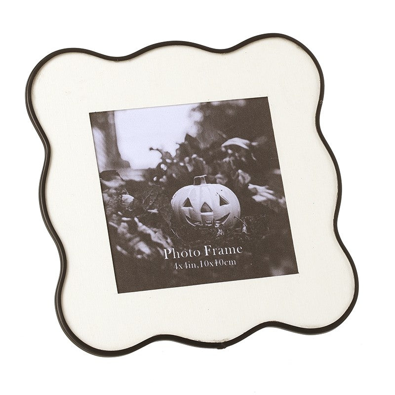 Decorative black wavy edge photo frame on a white background